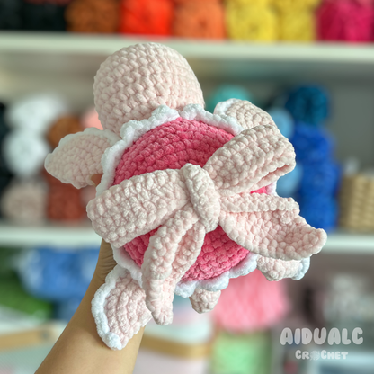 Tortuga Marina amb Llaç Rosa Amigurumi
